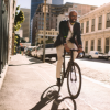 man on bike on a city street